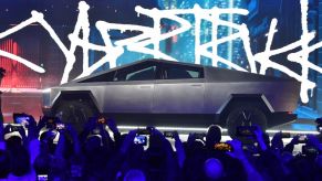 A stainless steel Tesla Cybertruck on display