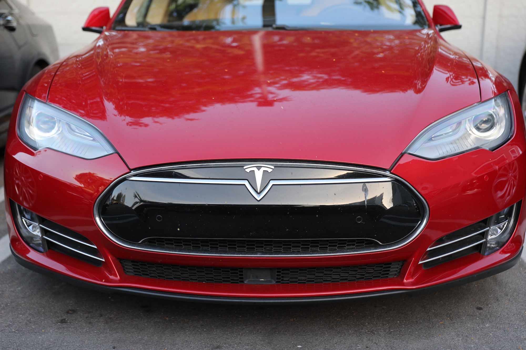 A red Tesla vehicle parked at a dealership in Miami, Florida, on January 3, 2019