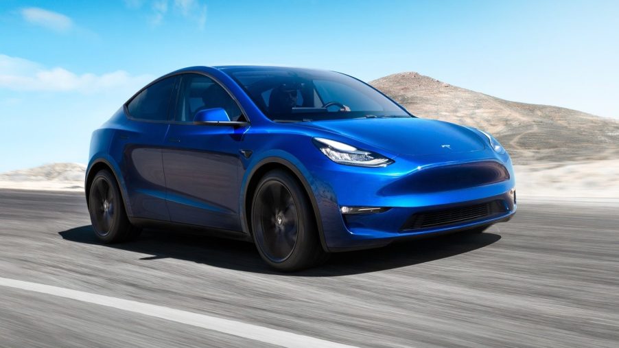 An image of a Tesla Model Y out on a race track.