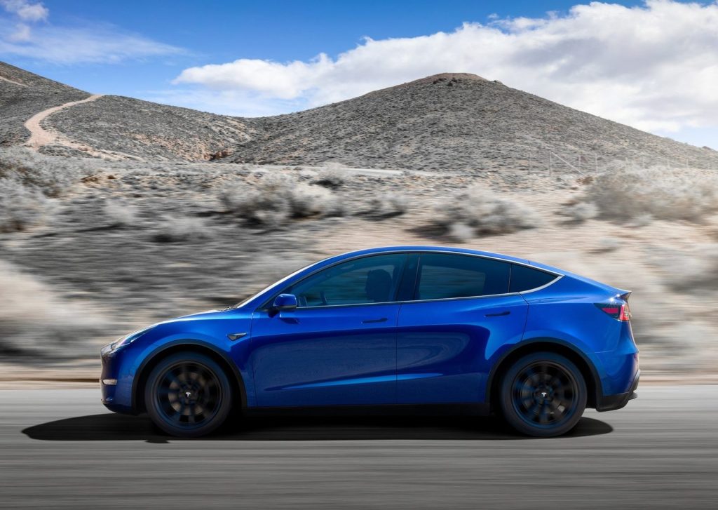 An image of a Tesla Model Y out on a race track.