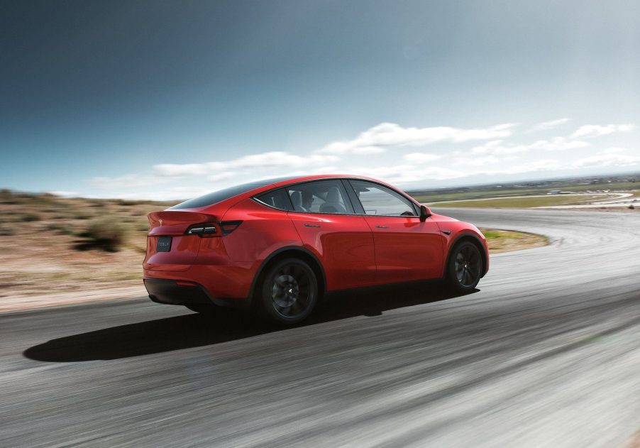 An image of a Tesla Model Y out on a race track.