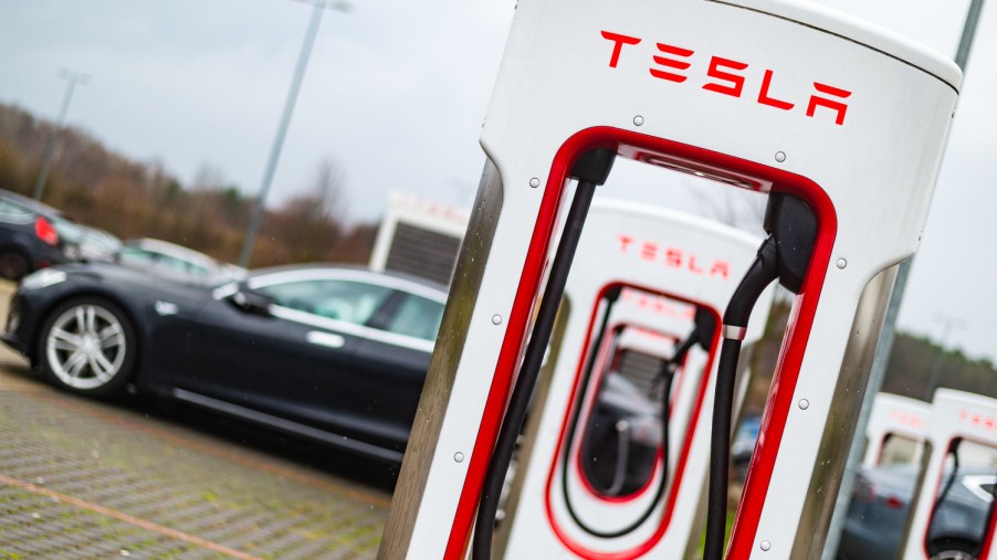 A row of Tesla superchargers at a station