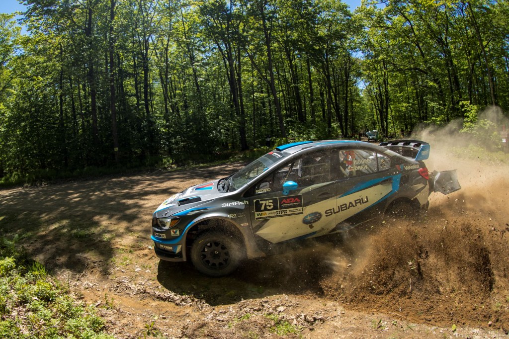 The black-blue-and-white #75 Subaru Rally Team WRX slides through the dirt at the 2017 Susquehannock Trail Performance Rally in Pennsylvania
