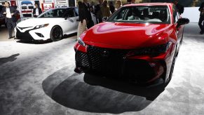 Toyota Motor Corp. Avalon TRD, right, and Camry TRD vehicles are displayed during AutoMobility LA ahead of the Los Angeles Auto Show