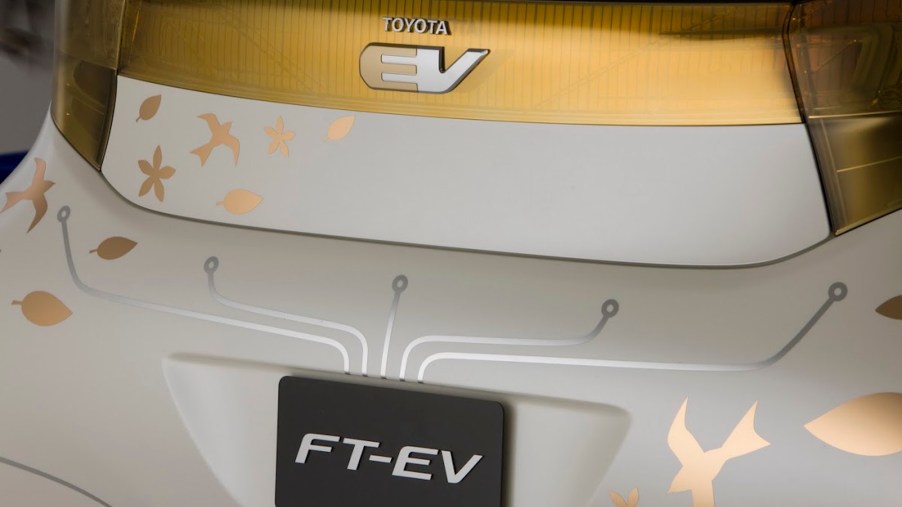 Gold and white Toyota EV back hatch
