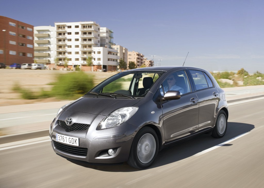 a grey 2009 Toyota Yaris driving