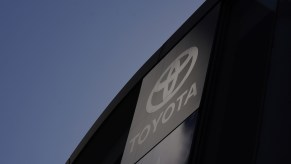 The Toyota logo displayed outside a dealership in Kawasaki, Japan, on Sunday, February 7, 2021