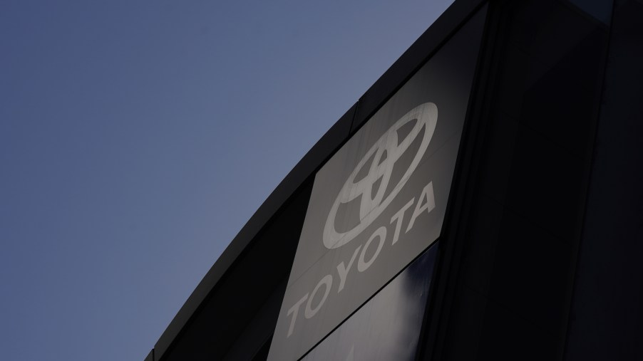 The Toyota logo displayed outside a dealership in Kawasaki, Japan, on Sunday, February 7, 2021