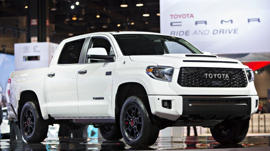 A white Toyota Tundra TRD Pro on display at an auto show