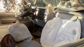 A set of deployed air bags in a car