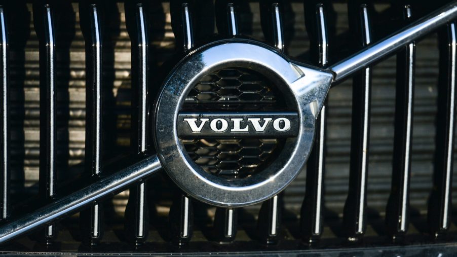 A Volvo logo seen on a parked car in Dublin city center.