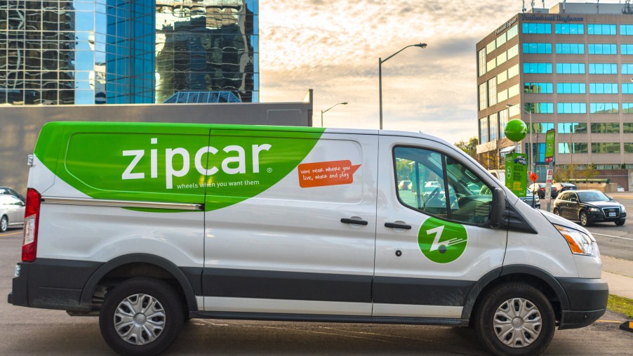 Zipcar rental cars include this white-and-green van parked in a Yonge Street parking lot in Toronto, Ontario, Canada