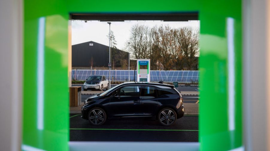 a gray BMW i3 pictured through a green frame
