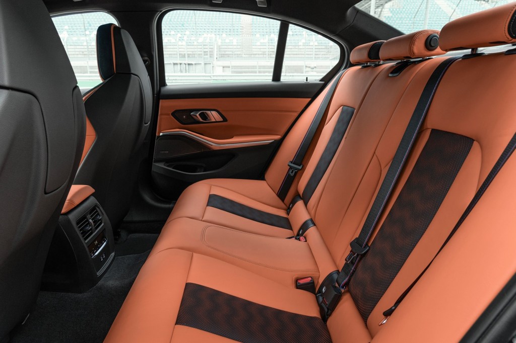 The orange leather interior of the back seats of the 2021 BMW M3 