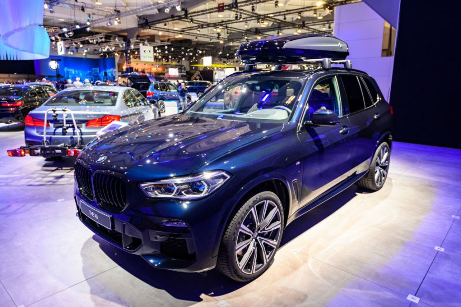 A dark blue 2021 BMW X5 SUV on display