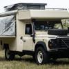1990 Land Rover Defender 130 dream RV camper-truck conversion parked in a field