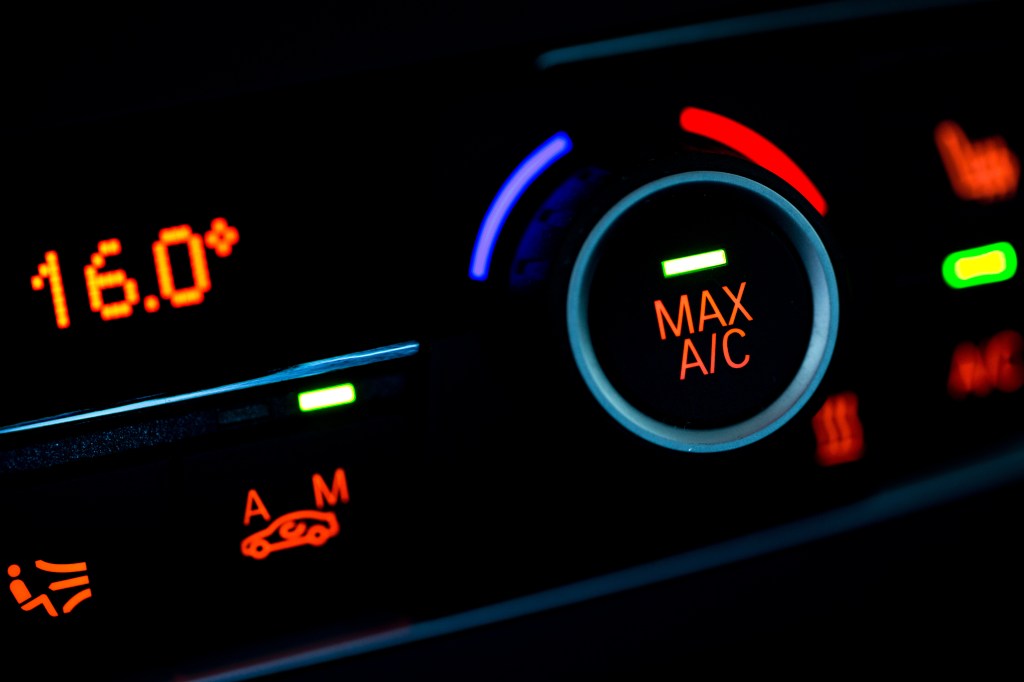 A photo of a car's air conditioner set to maximum cooling. 
