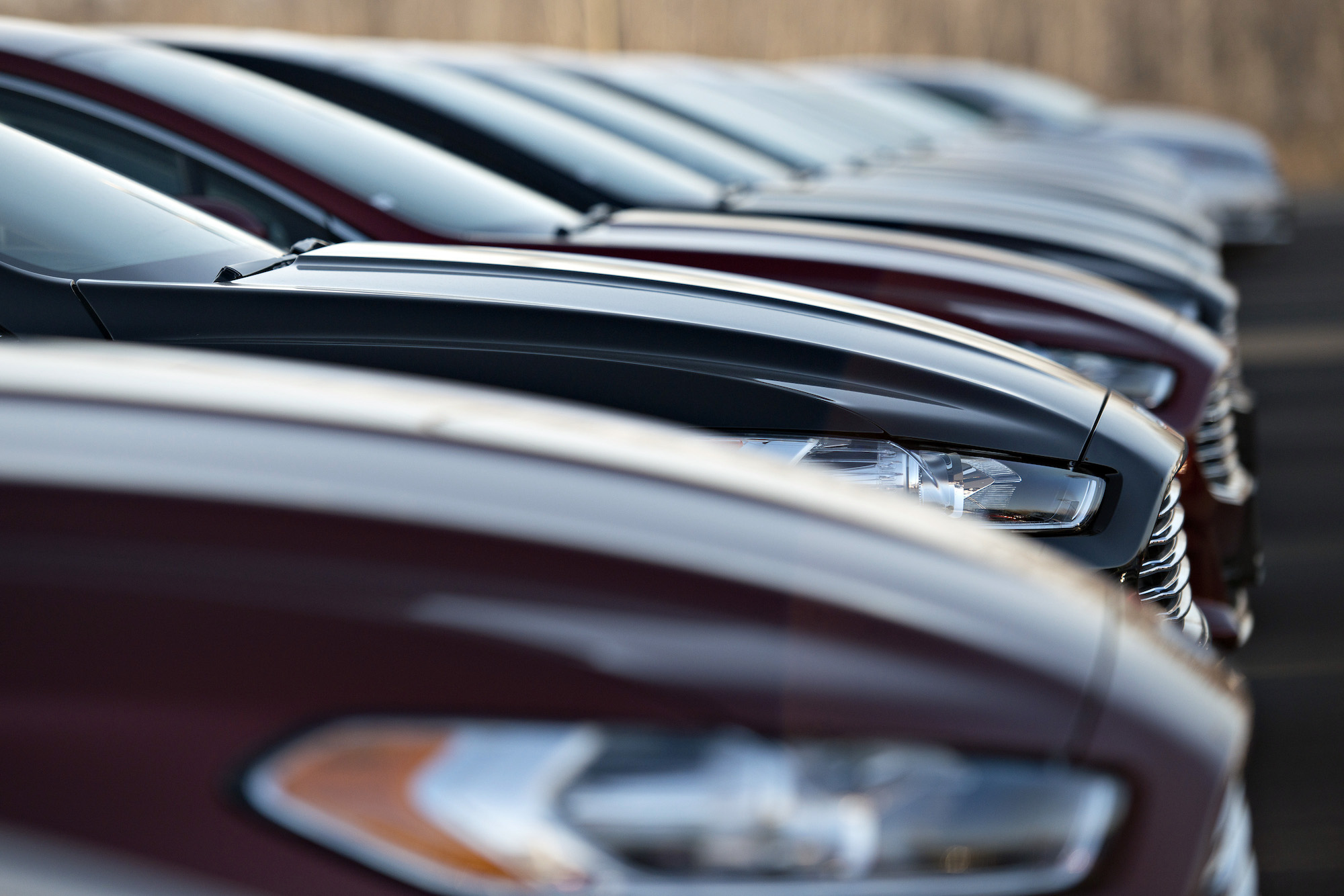 A row of 2014 Ford Fusion vehicles sit on a car sales lot at Uftring Ford in East Peoria, Illinois, on Saturday, November 30, 2013