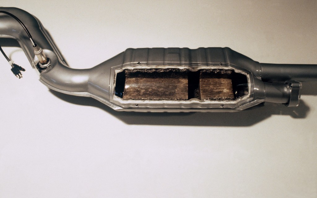 A cutaway shot of a catalytic converter.