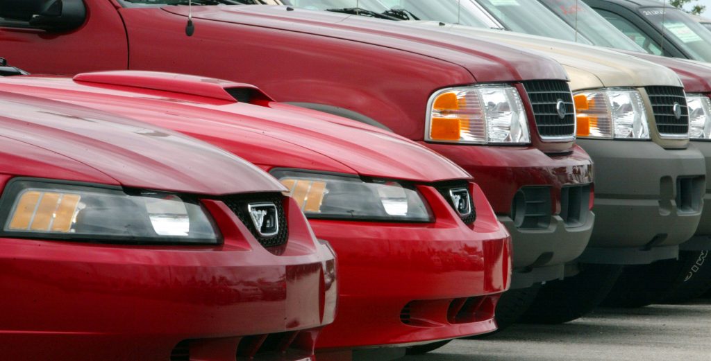 Ford Mustangs and Explorers sit on the sales lot at World Ford. 