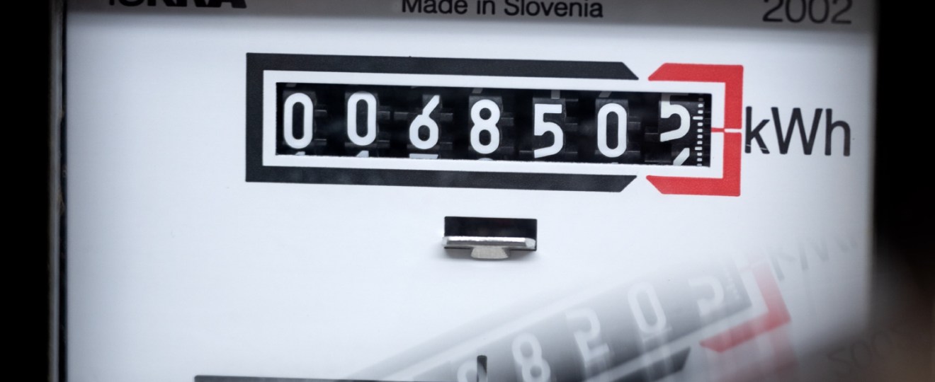 A meter shows how many kilowatt-hours a residential building is using