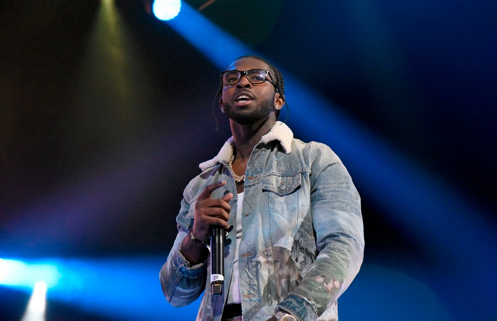 Rapper Pop Smoke on stage preforming