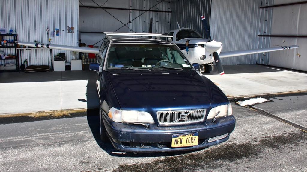 This blue Volvo station wagon is the most expensive volvo ever due to its "New York" vanity plate