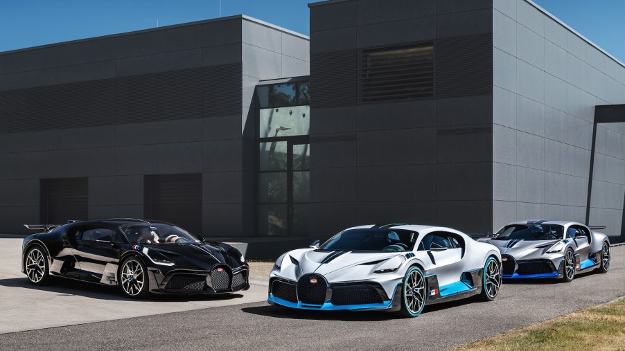 An image of a few Bugatti Divo models parked outside.
