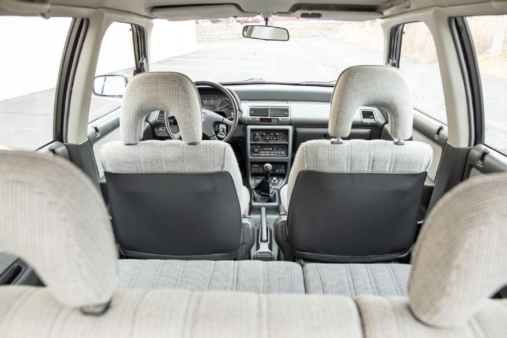 The gray-cloth interior of a 1991 Honda Civic 4WD Wagon seen from the rear hatch