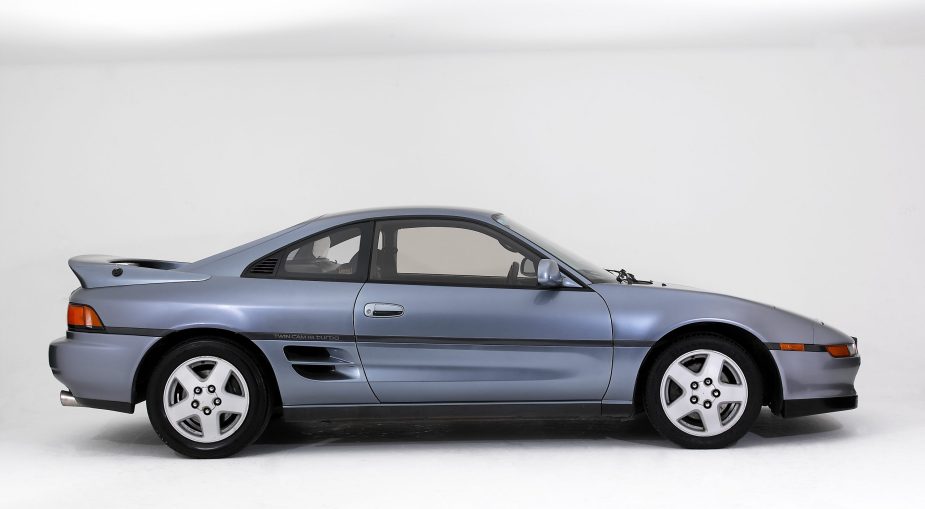 A silver Toyota MR2 coupe on display