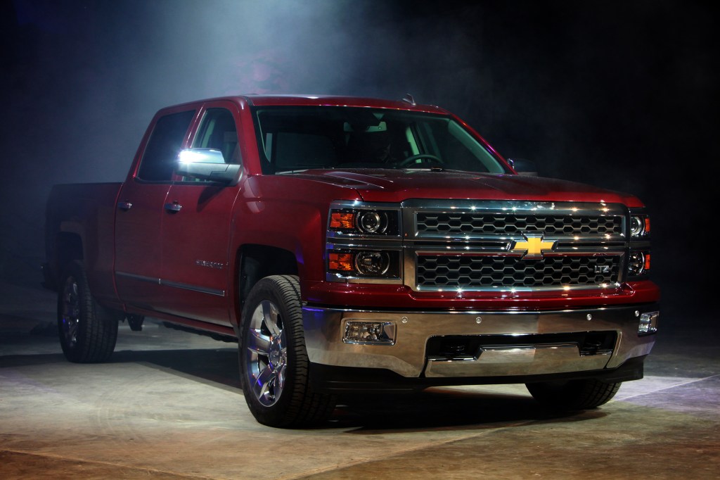 a red 2014 Chevy Silverado on display