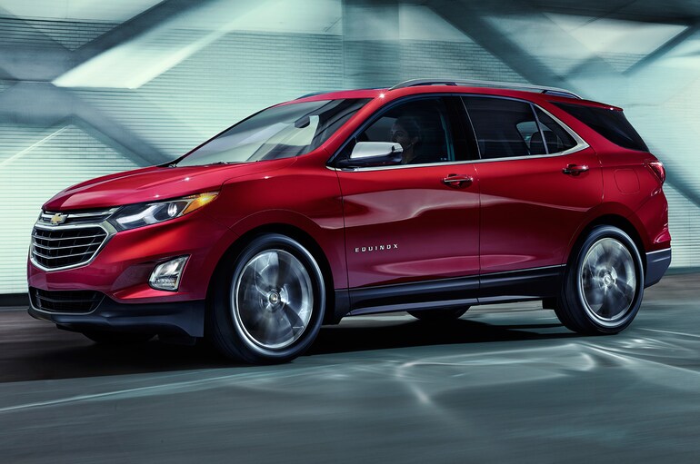 The 2018 Chevy Equinox driving on the road