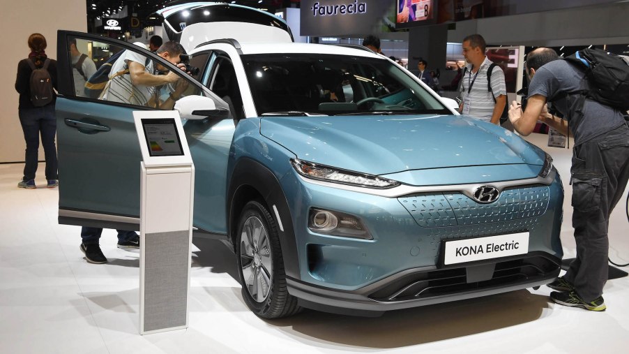 A light-blue 2018 Hyundai Kona electric crossover SUV on display at the 2018 Paris International Motor Show