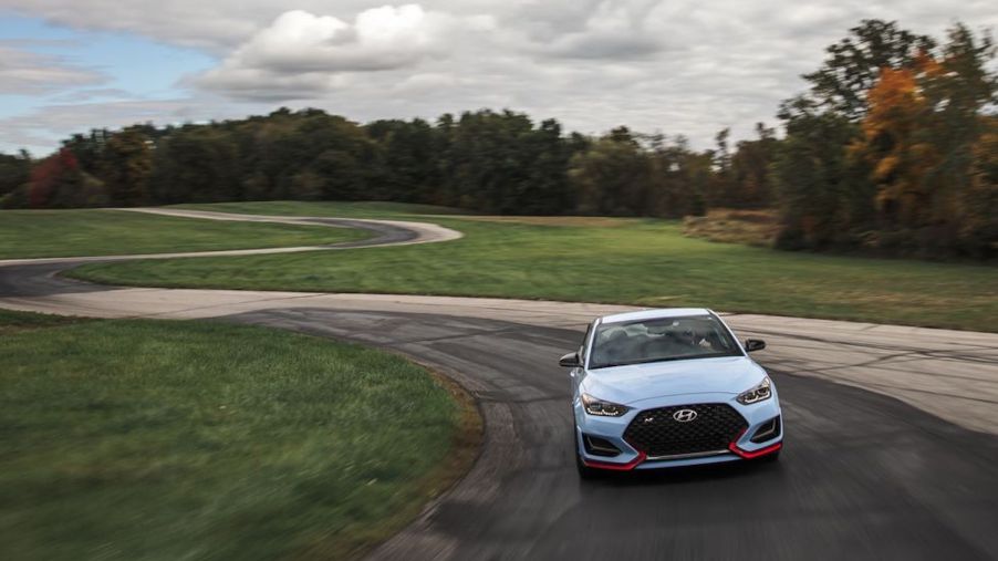 Performance Blue 2019 Hyundai Veloster N being tested on Car and Driver track