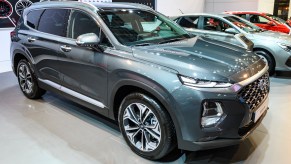 A dark-gray metallic 2020 used Hyundai Santa Fe midsize SUV on display at Brussels Expo on January 9, 2020, in Brussels, Belgium