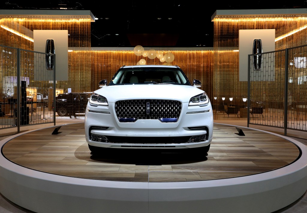 A white 2020 Lincoln Aviator SUV on display