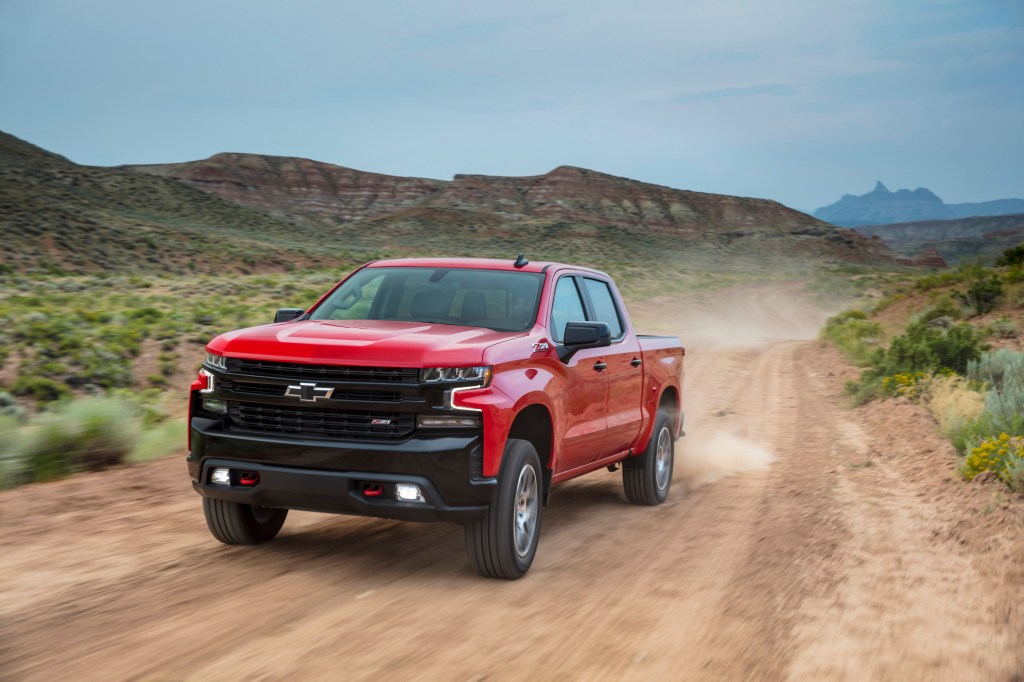 2021 Chevrolet Silverado LT Trail Boss driving down a dirt road