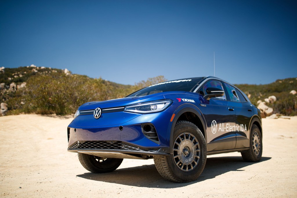 The front 3/4 view of the blue 2021 NORRA Mexican 1000 Volkswagen ID.4 in the Baja Peninsula desert