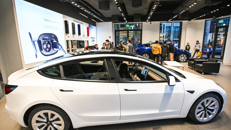 A white Tesla Model 3 at a Tesla flagship store on January 4, 2021, in Shanghai, China