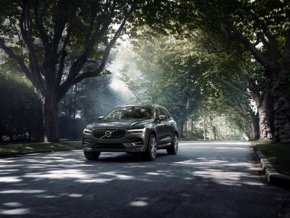A 2021 Volvo XC60 Inscription luxury compact crossover SUV with Pine Grey metallic exterior paint