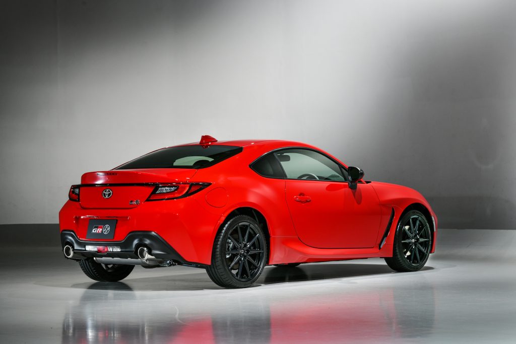 An image of a Toyota GR 86 parked inside of a photo studio.