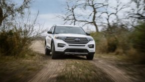 2021 Ford Explorer Kind Ranch Edition in white driving off road