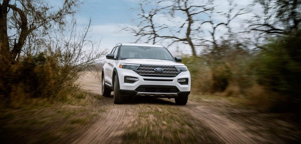 2021 Ford Explorer Kind Ranch Edition in white driving off road