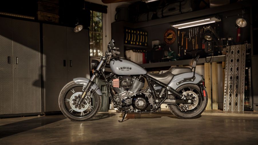 A gray 2022 Indian Chief Dark Horse with Rogue Collection accessories in a garage