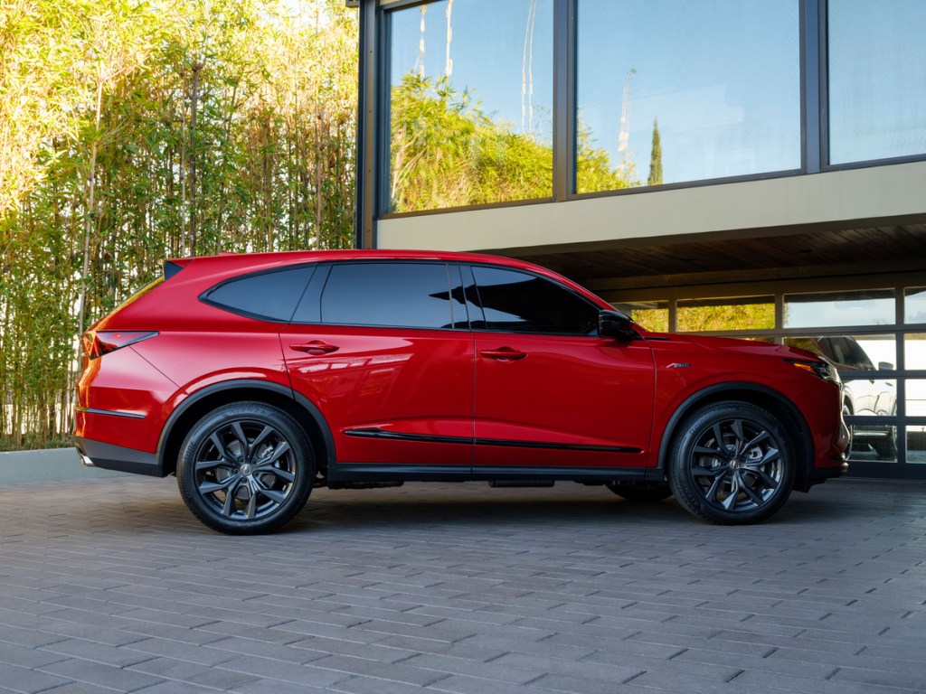 A side shot of the 2022 Acura MDX A-Spec in red