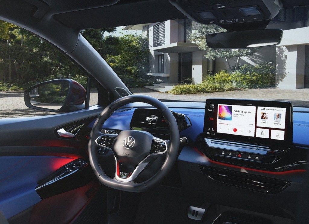 The driver's-side of the red-and-blue-trimmed interior of the 2022 Volkswagen ID.4 GTX