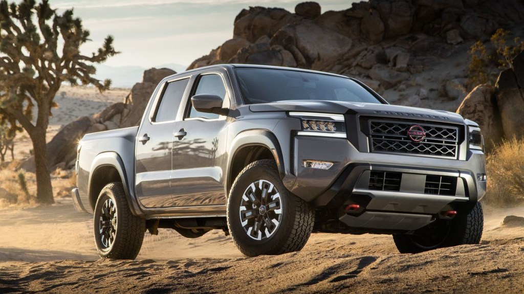 The 2022 Nissan Frontier Pro 4X parked in sand