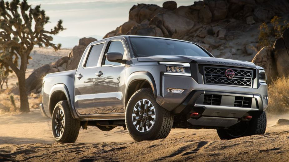 The 2022 Nissan Frontier Pro 4X parked in sand