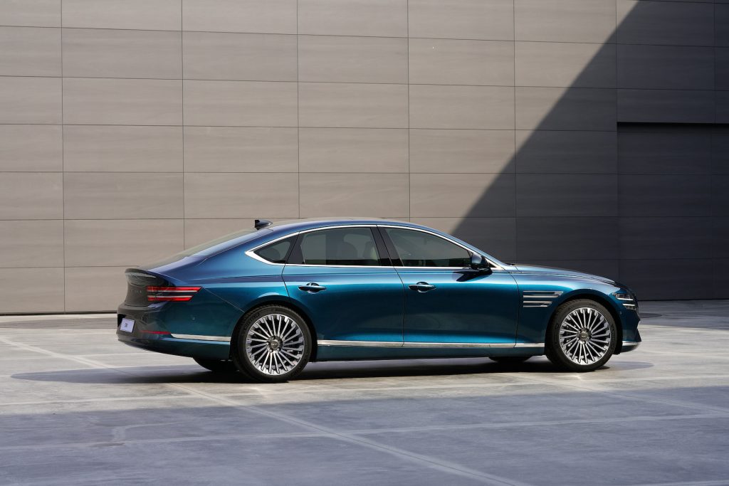 An image of a Genesis Electrified G80 parked outside.