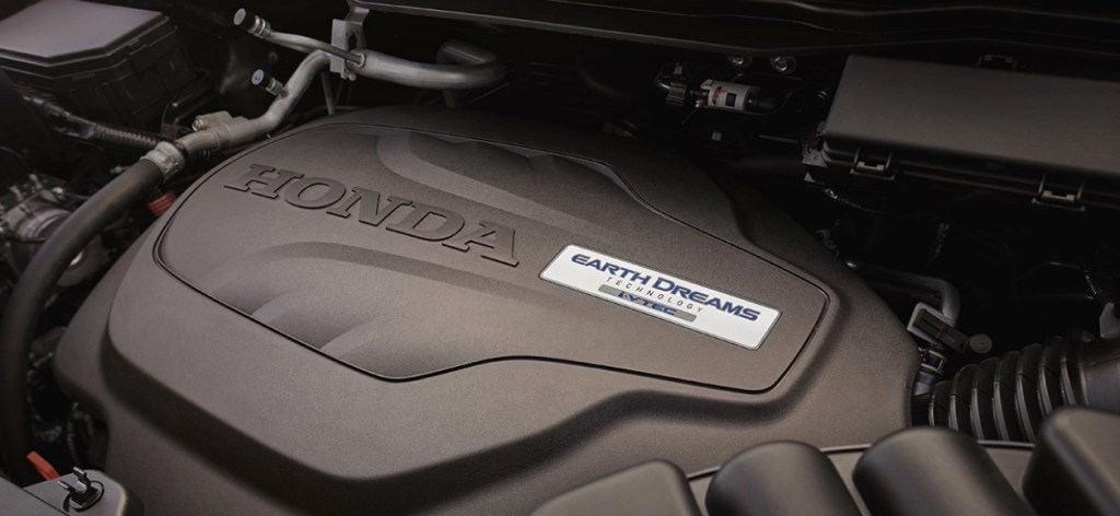 A close up view of the V6 engine under the hood of the 2021 Honda Passport